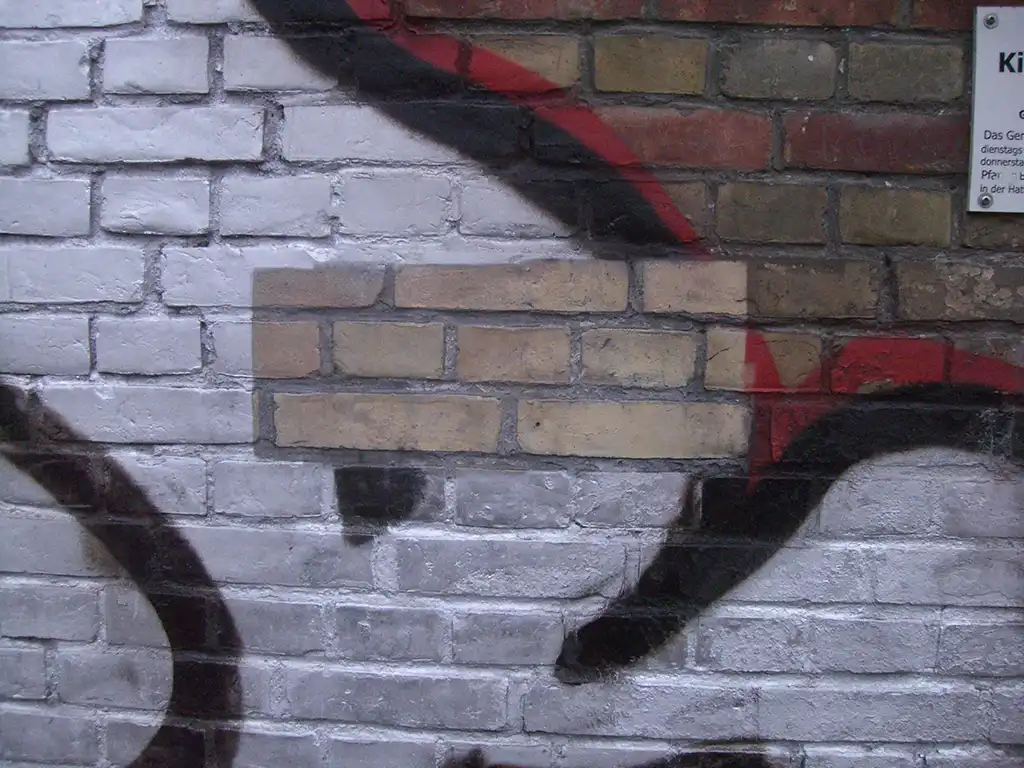 Beispiel einer effektiven Graffitientfernung Beispiel einer effektiven Graffitientfernung